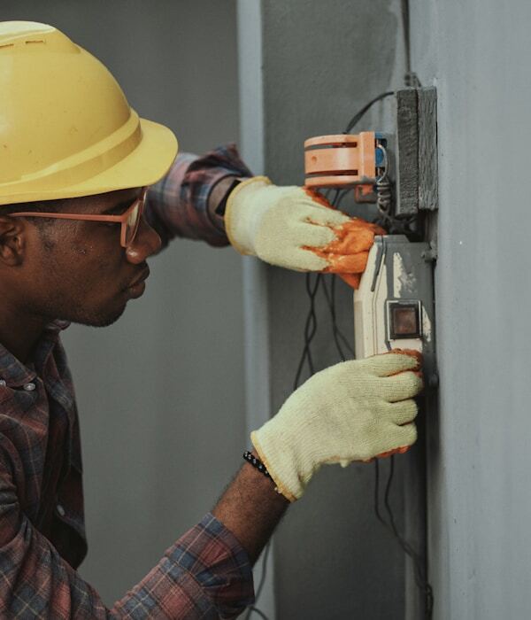 Electrician working on a panel